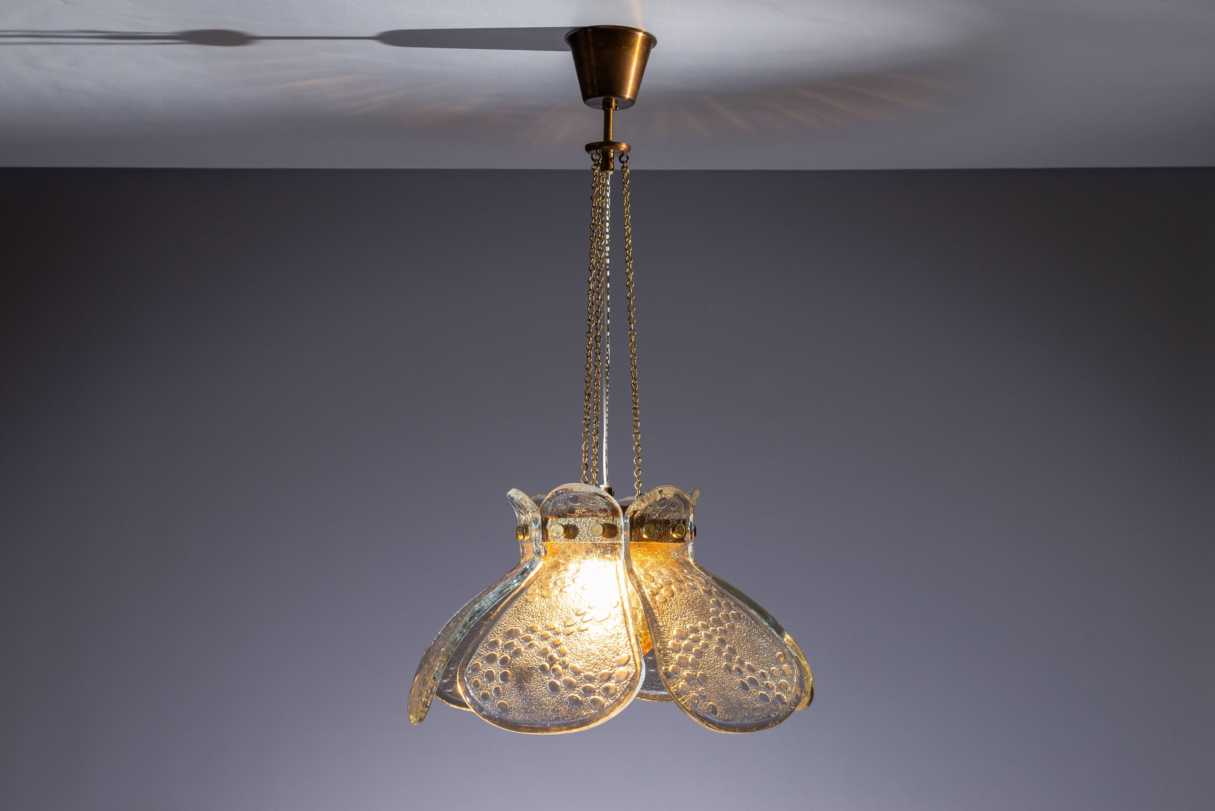 Swedish pendant with glass leaf shades and a center shade of amber coloured
