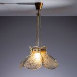 Swedish pendant with glass leaf shades and a center shade of amber coloured