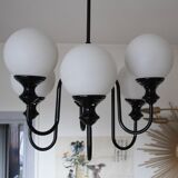 Metal chandelier and glass globes