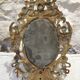 Miroir en bronze à décor d'angelots et mascarons fin 19ème siècle