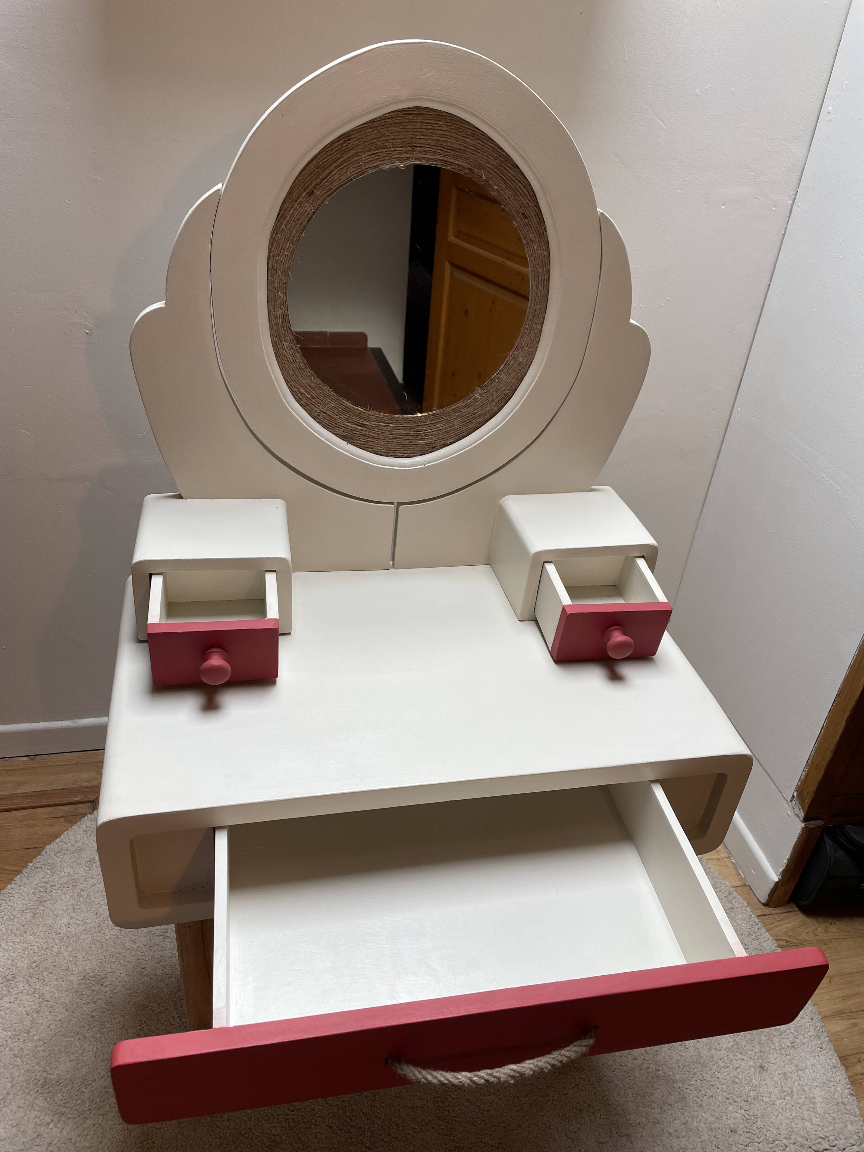 Wooden dressing table with beige and red baroque style mirror
