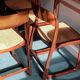 Suite de 6 chaises traineau Baumann cannées vintage