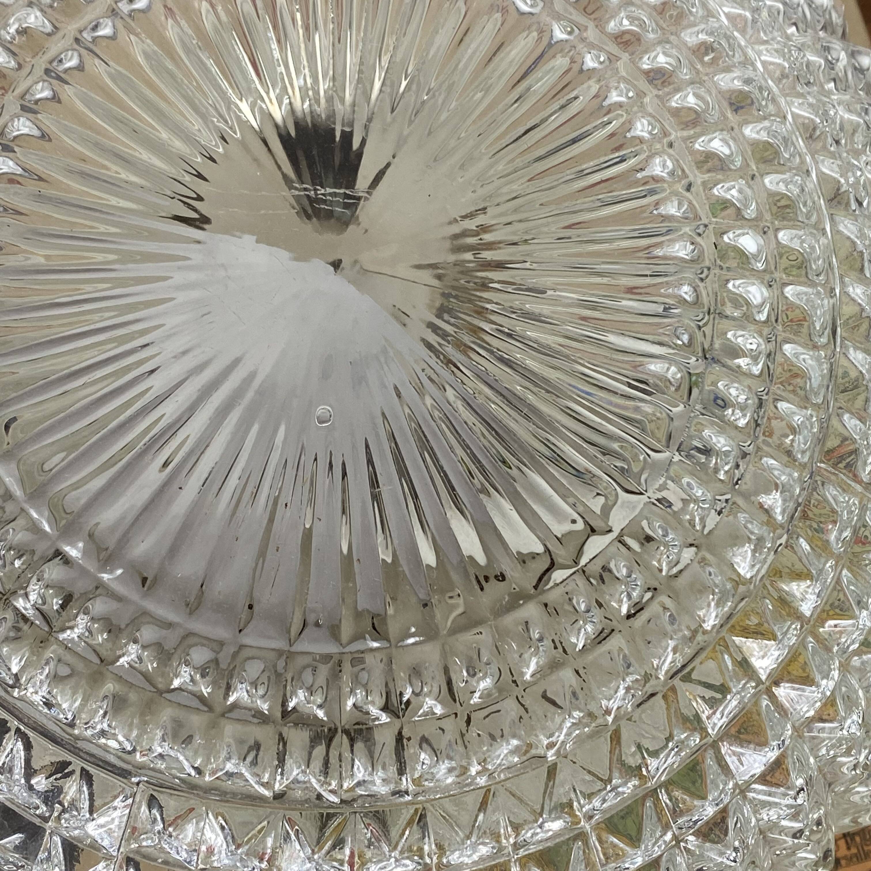 Large pair of round wall sconces ceiling lights in transparent glass.