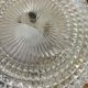 Large pair of round wall sconces ceiling lights in transparent glass.
