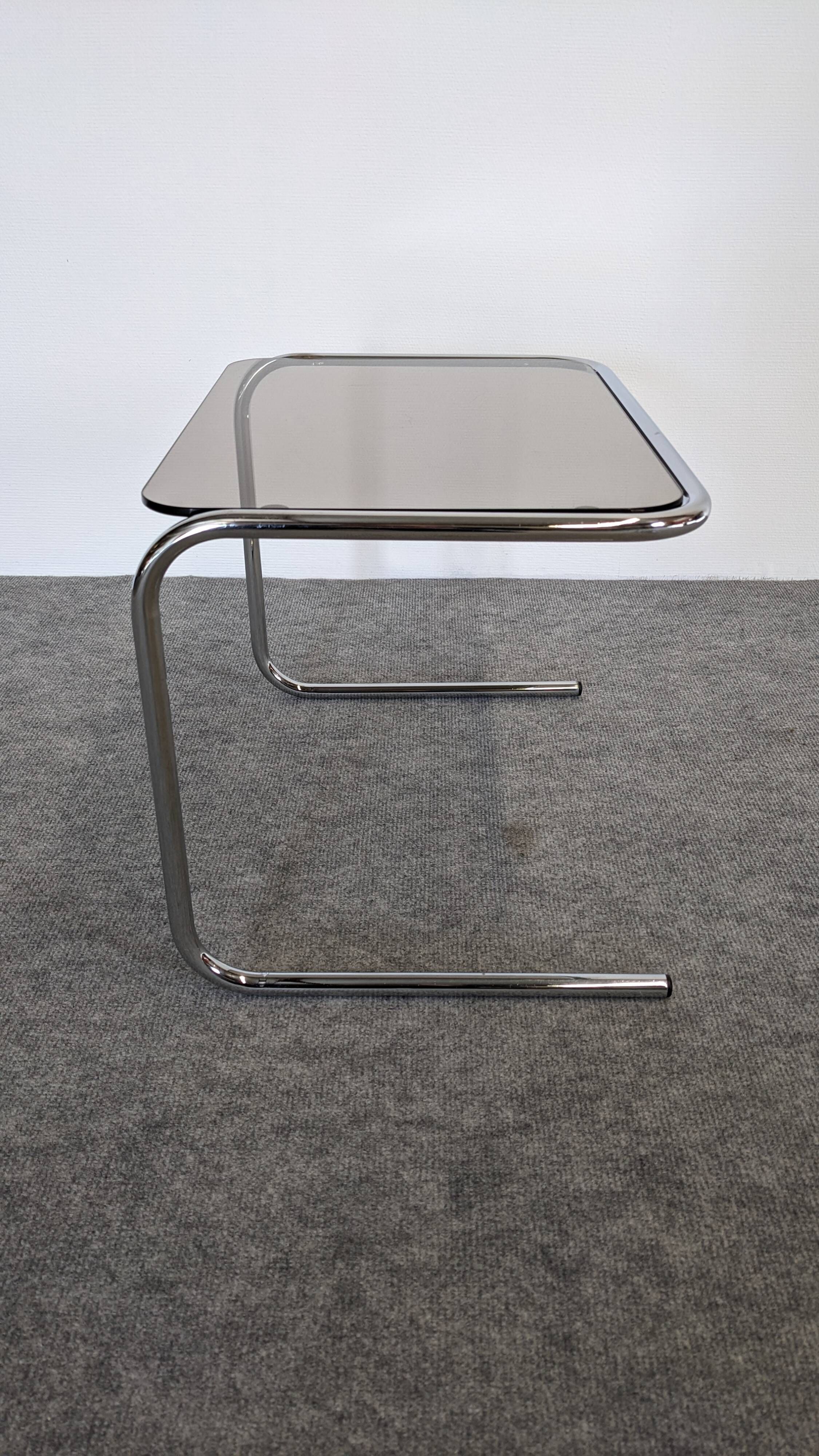 Nested tables with tubular chrome and smoked glass, France 1970.