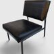 Modernist armchair in black faux leather and metal – 1960s