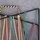 Vintage foldable magazine holder in metal and scoubidou