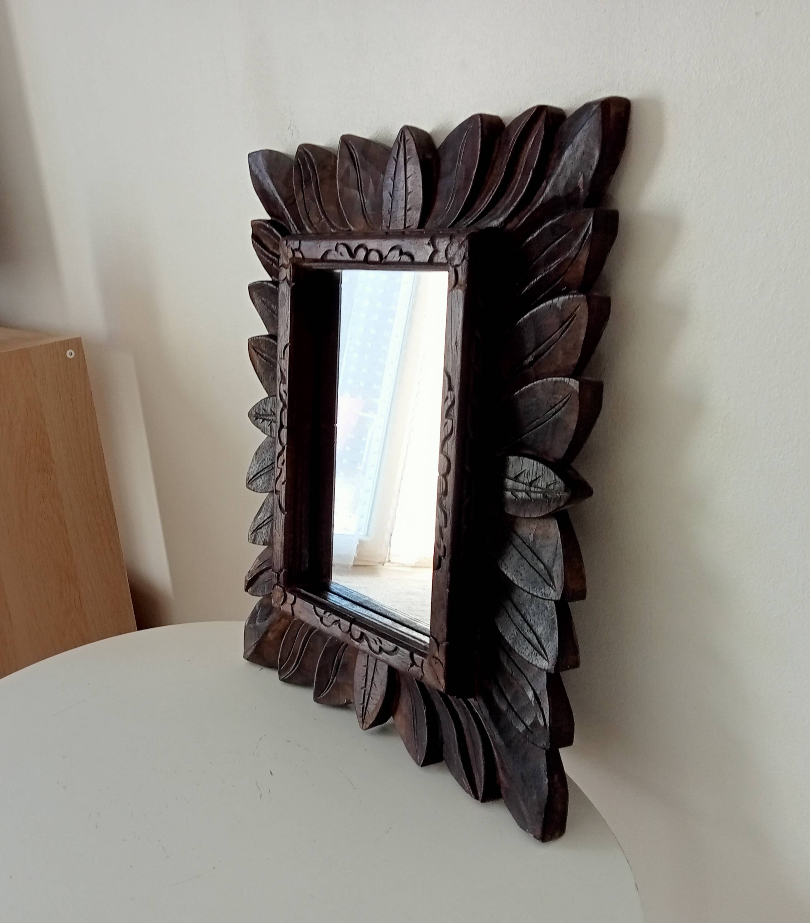 Antique mirror in carved wood