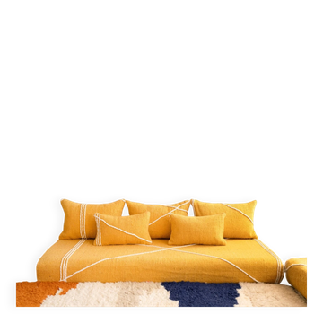 Set of yellow Moroccan floor sofa covers.