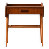 Bedside table with rattan magazine rack