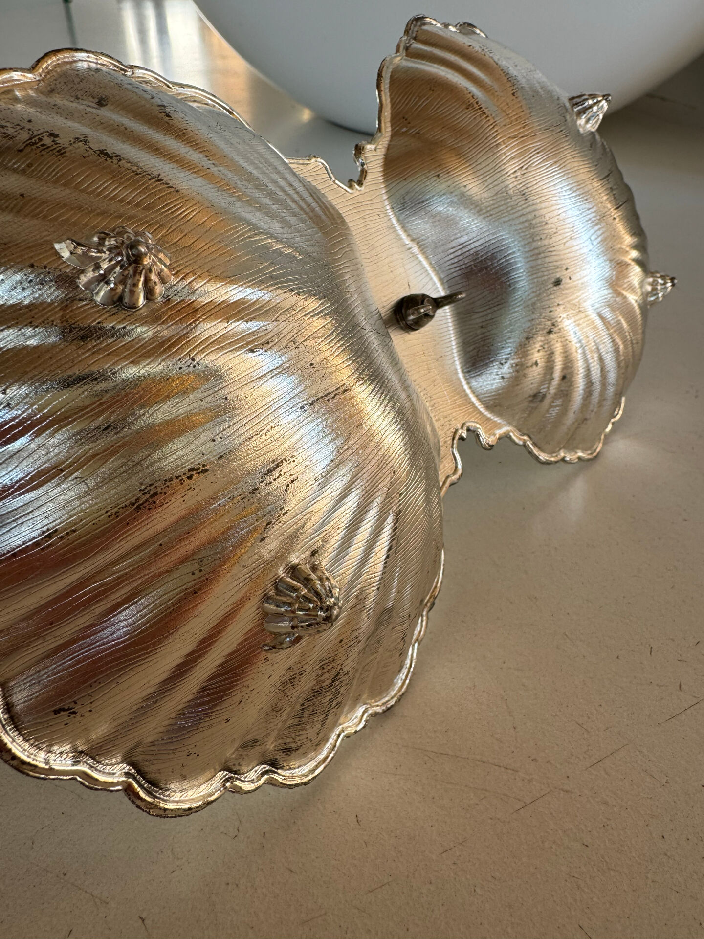 Vintage silver-plated shell display stand