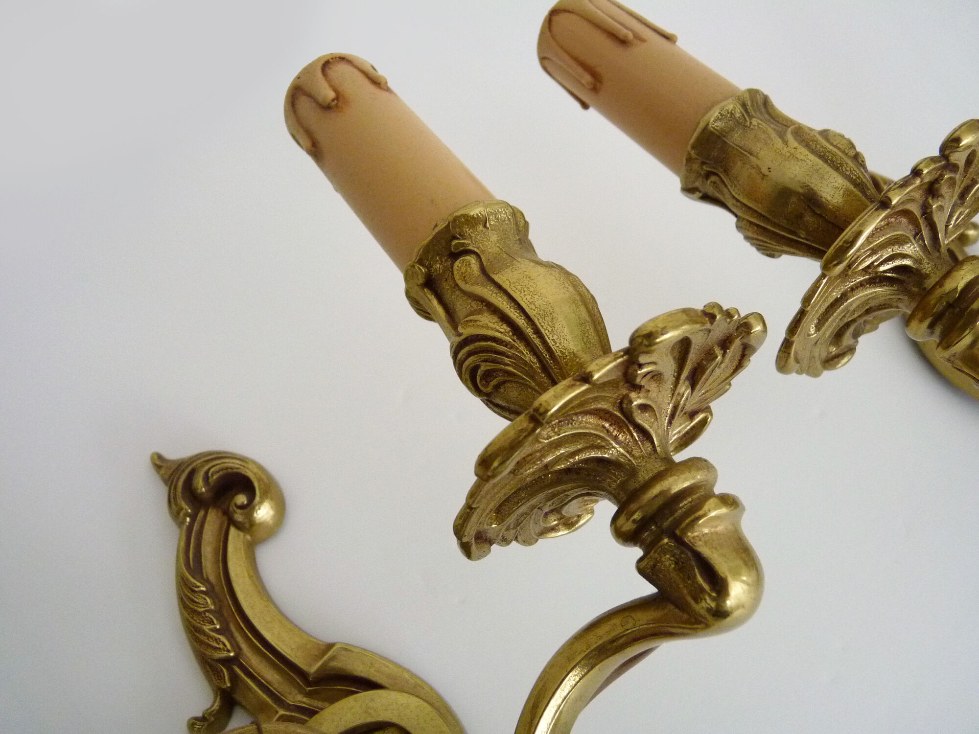 Old pair of wall sconces with double fires in bronze, 50s