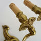 Old pair of wall sconces with double fires in bronze, 50s
