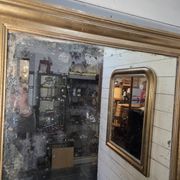 Golden mirror in oak from the 19th century.