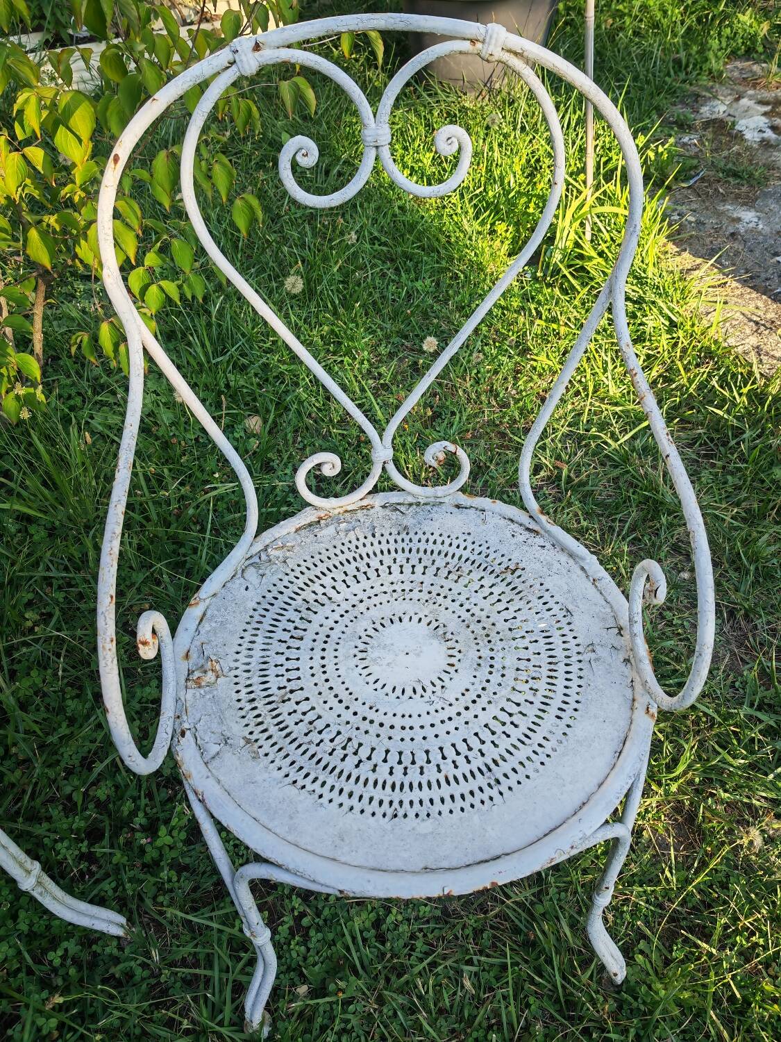 2 antique wrought iron armchairs