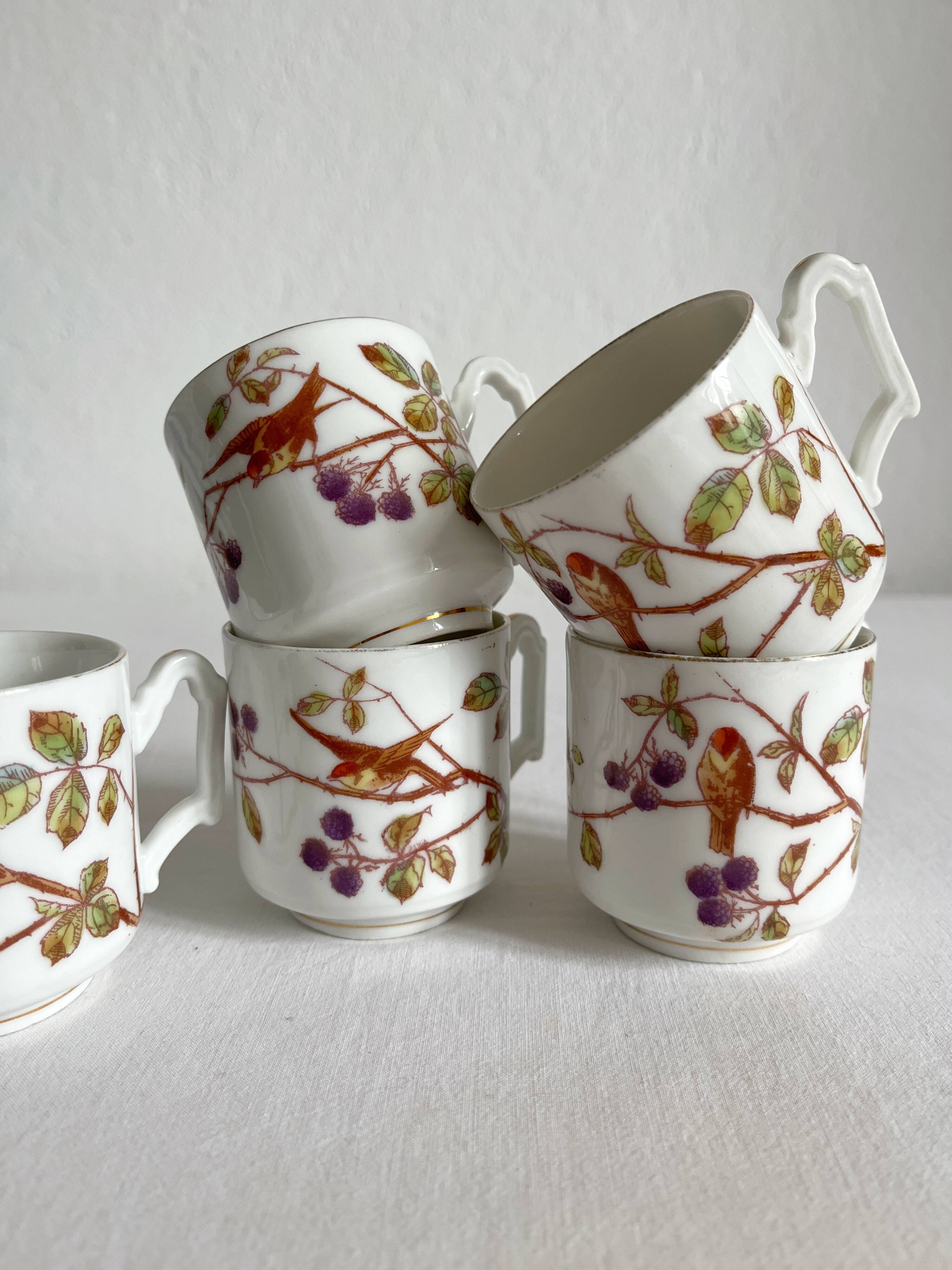 5 antique porcelain coffee cups decorated with birds