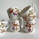 5 antique porcelain coffee cups decorated with birds
