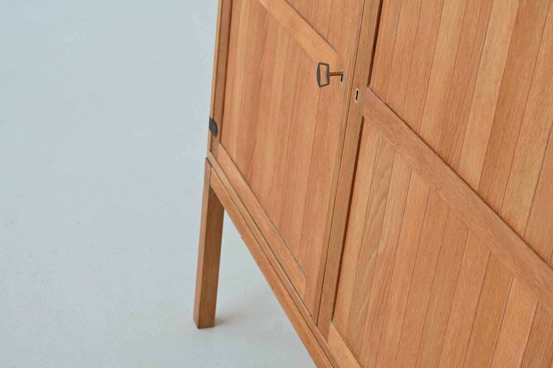 Kurt Ostervig high cabinet in oak A/S Randers Denmark 1960
