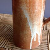 Pitcher in water in sandstone