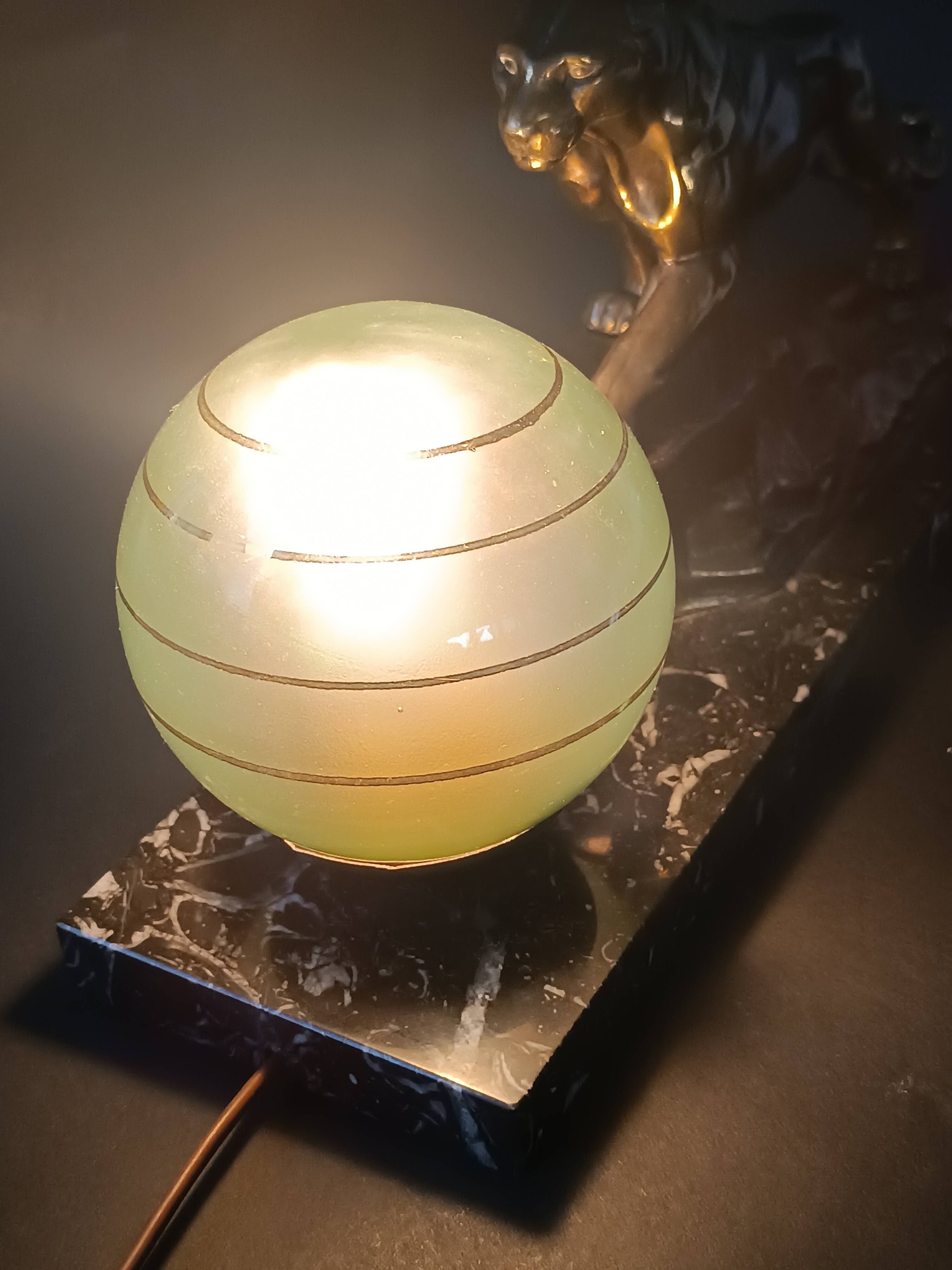 Panther desk lamp in spelter on a black and white marble base 1925