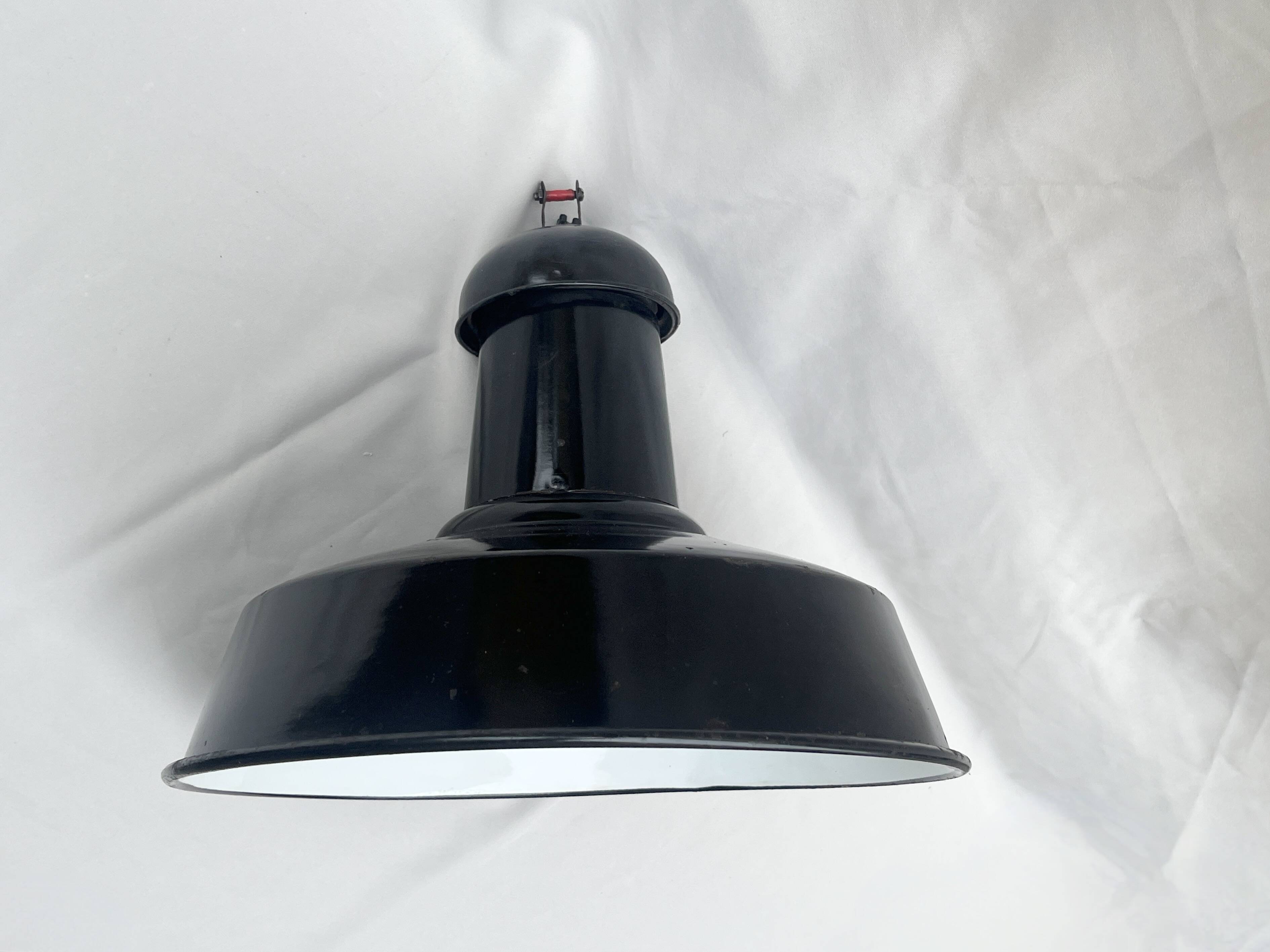 Industrial pendant light in black and white enamelled sheet metal factory bowl