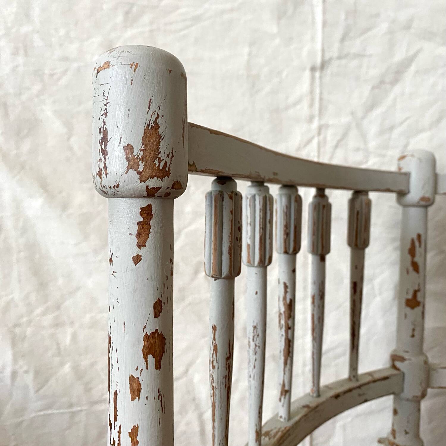 19th-century corner fireplace armchair, wood and cane.