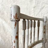 19th-century corner fireplace armchair, wood and cane.