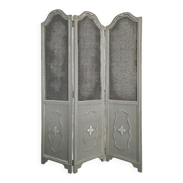 Louis XVI style caned screen with a re-champis finish.