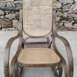 Vintage wooden and cane rocking chair