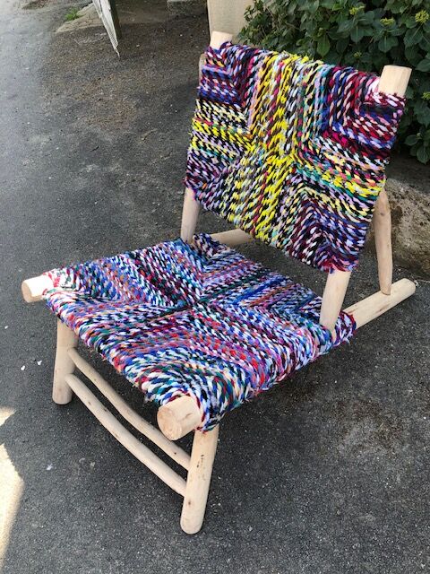 Wooden armchair braiding multicolored fabrics