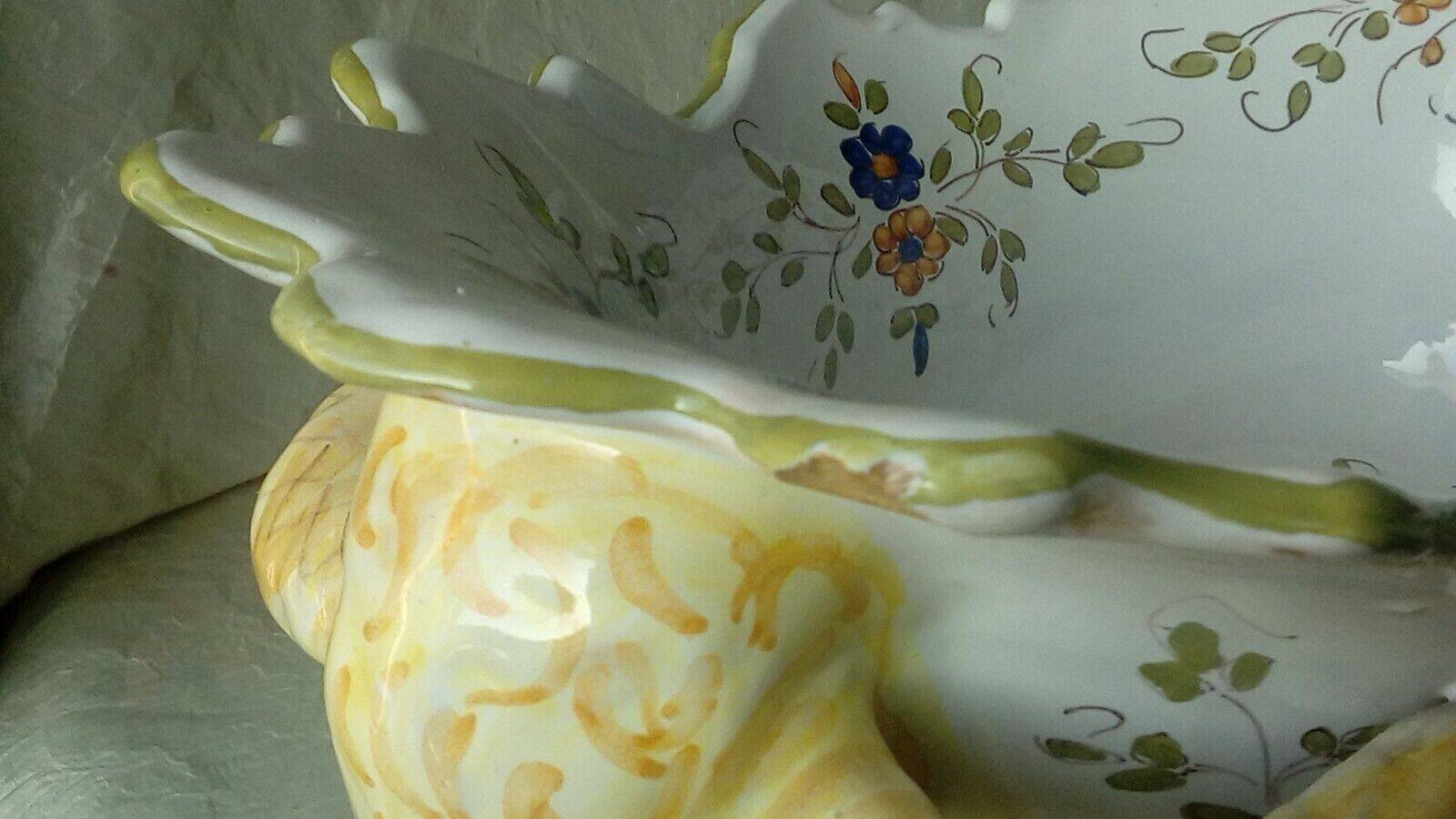 Moustiers earthenware planter with ram's head