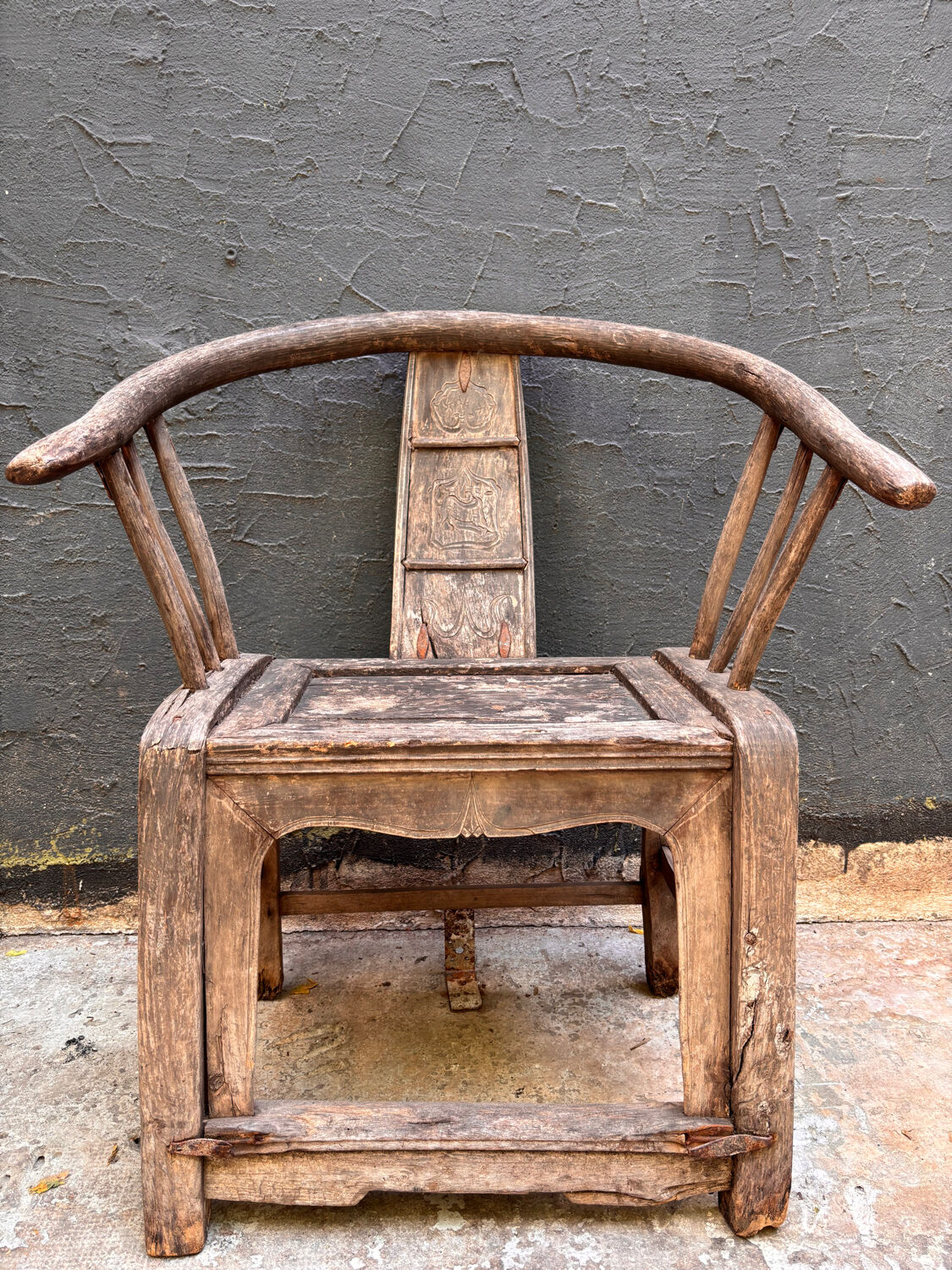 Pair of antique Chinese armchairs in patinated wood