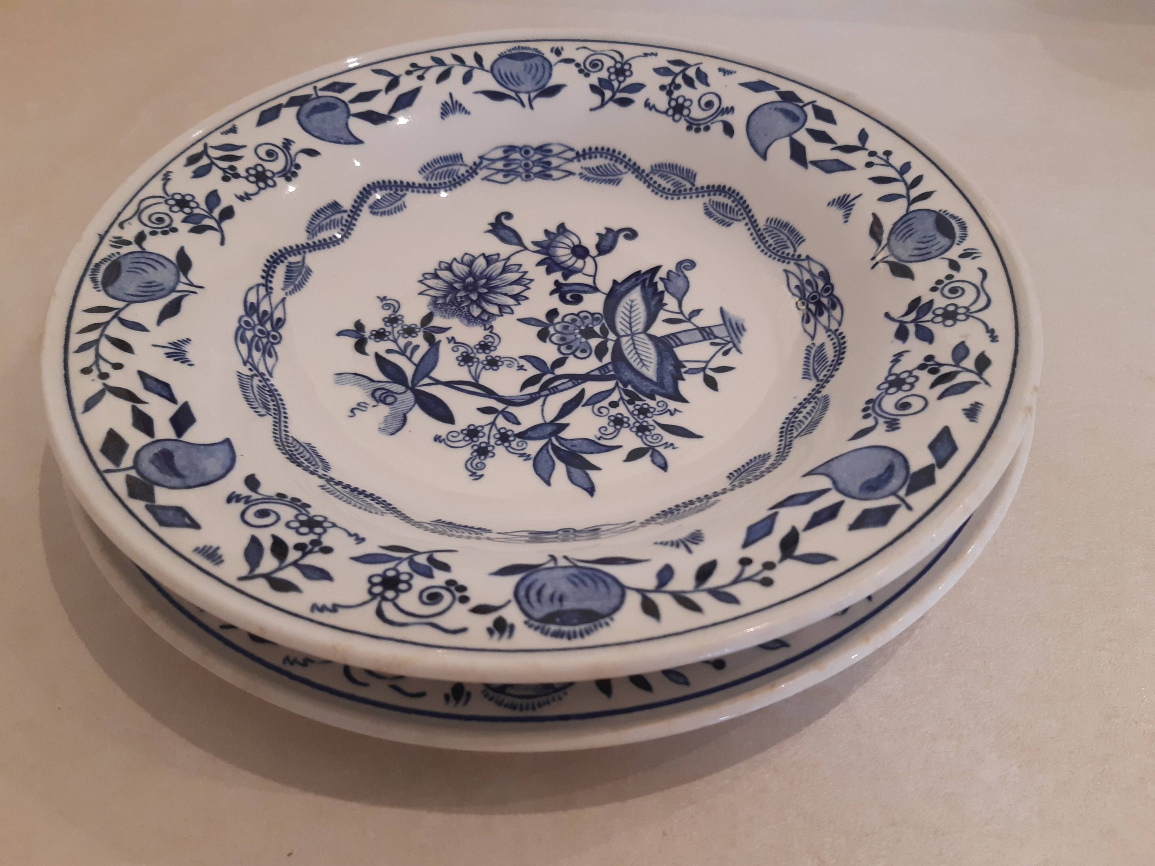 Set of two plates, flat and deep, with a country blue decoration.