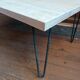 Coffee table in solid bamboo with steel legs.