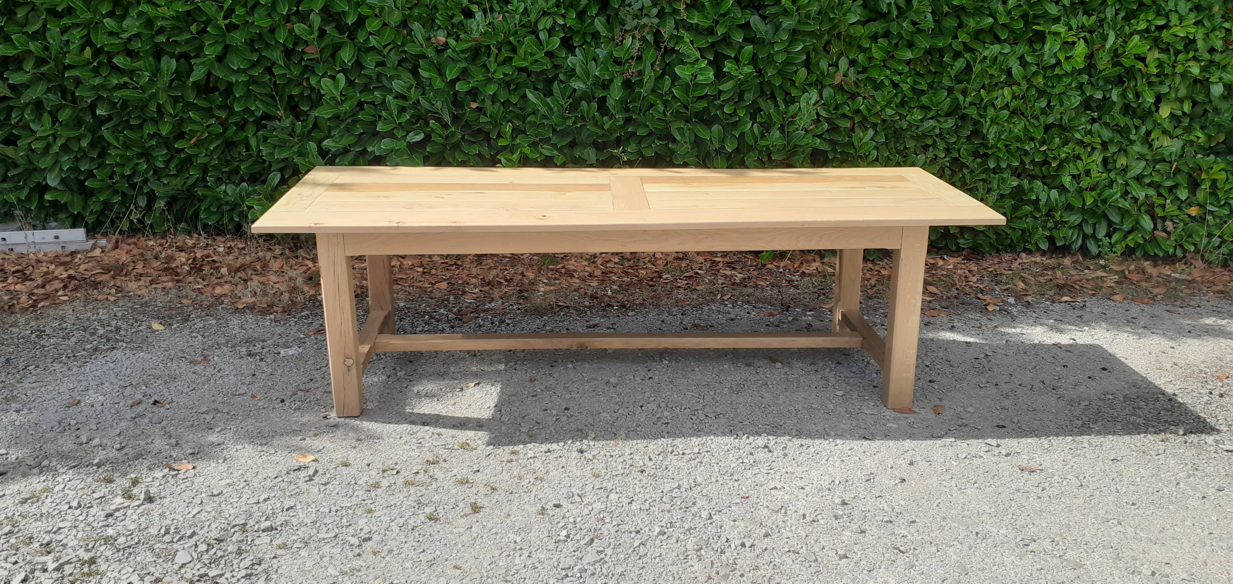 Large solid oak farmhouse table in raw wood