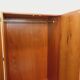 Vintage modernist wardrobe in teak and metal from the 1960s.