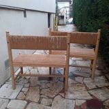 2 wooden and straw benches