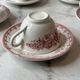 Set of 5 cups and saucers Sarreguemines with red rose decoration.