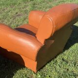 pair of leather clubs