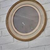 Round gilded wooden frame