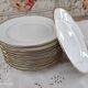 Lot de 11 assiettes à dessert en porcelaine suisse blanche double liseré doré