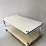 Vintage steel coffee table from the 1970s on wheels.