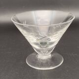 Glassware and bottle set in chiseled glass with flower motif