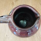 Stoneware pitcher by Matthieu Liévois in shades of red