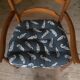 Large fauteuil paillé
