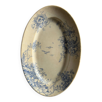 Oval blue presentation plate with birds.
