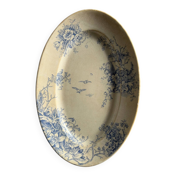 Oval blue presentation plate with birds.