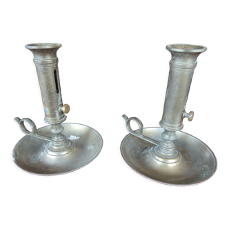 Pair of hand candle holders with pusher