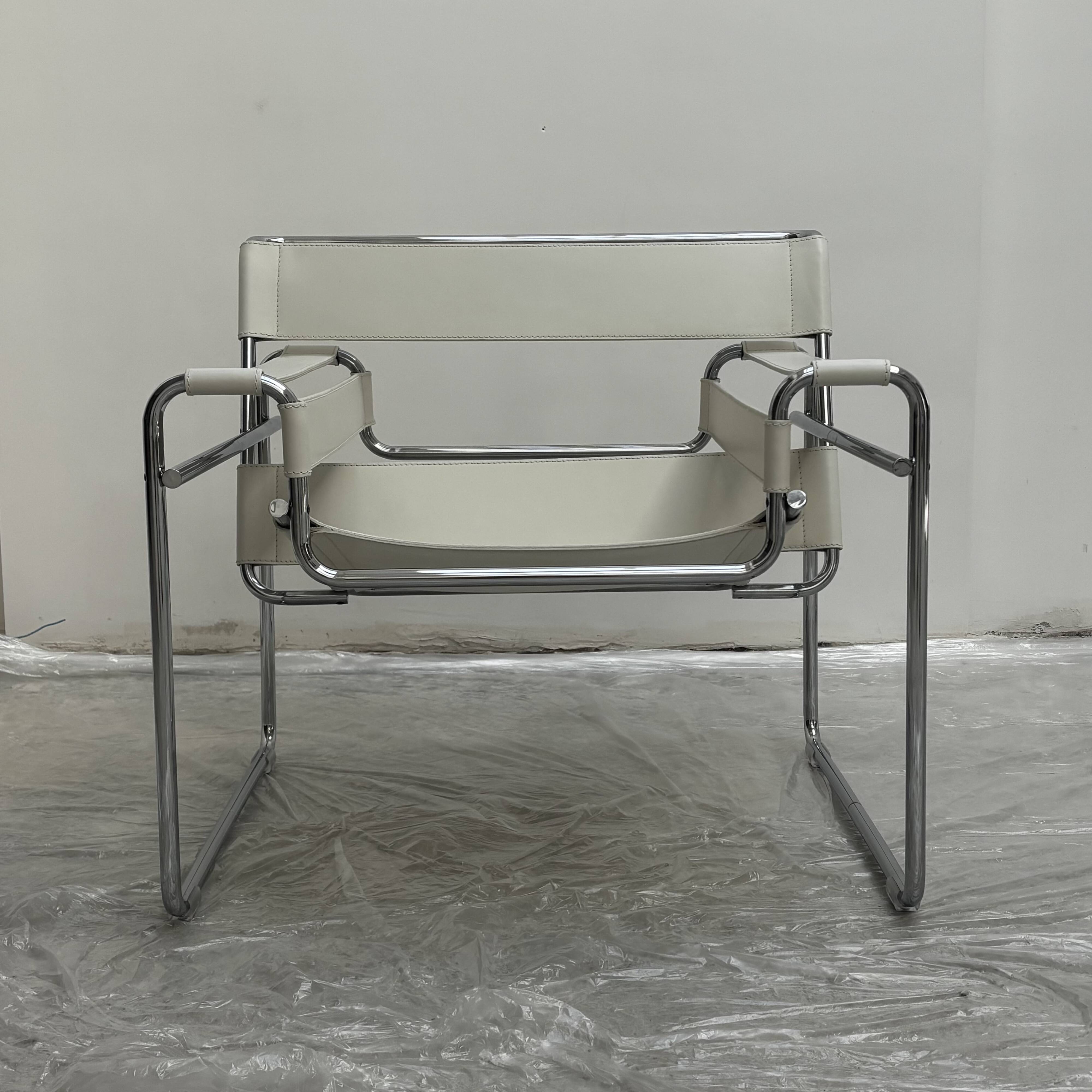 "Wassily" armchair by Marcel Breuer for Gavina in white leather.