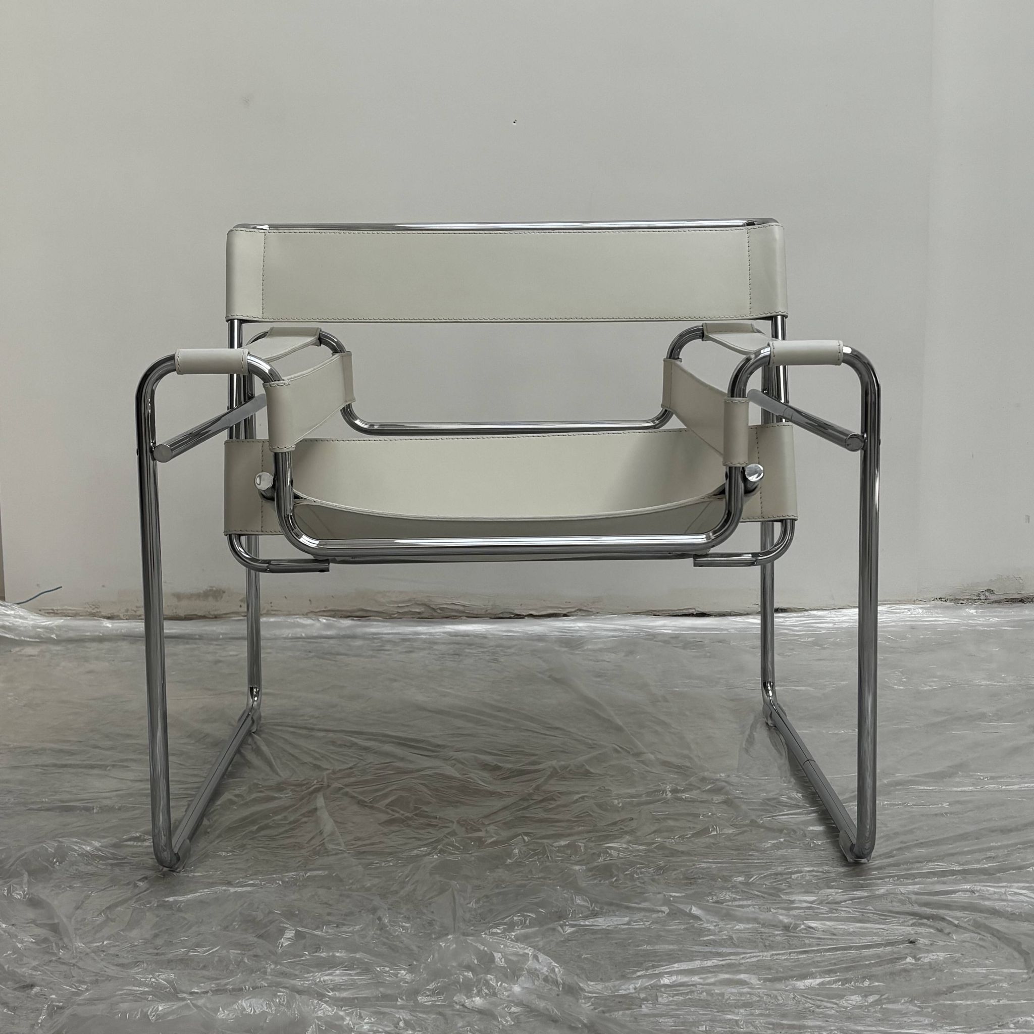 "Wassily" armchair by Marcel Breuer for Gavina in white leather.